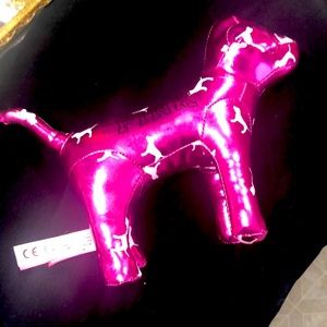 Pink metallic plush dog.